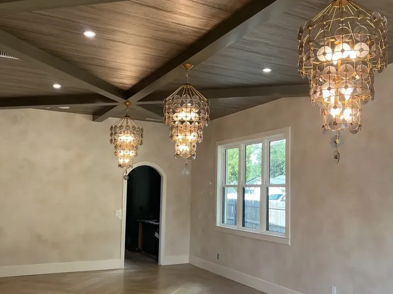 Walk-in shower with floor-to-ceiling tile.