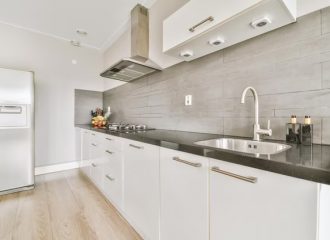 Kitchen remodel with custom cabinetry and tile backsplash